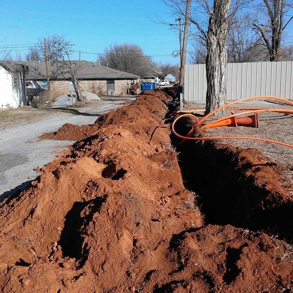 This alley behind the Carnegie Nursing Home has a huge trench cut open in order to put the new fiber cables in the ground. 
