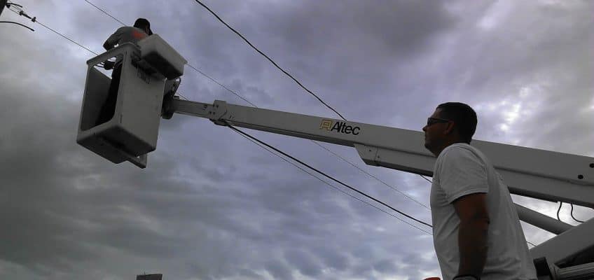 Image of tearing down cables in Carnegie, Oklahoma
